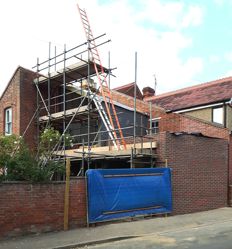 two storey extension red brick zinc cladding  east oxford 